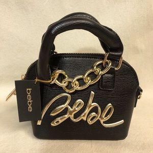 Bebe petite purse, with shoulder strap. New